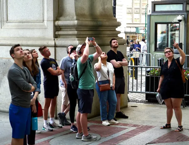 guests and guide looking up