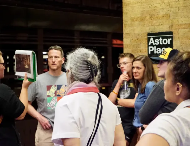 guide talking to a group of guests
