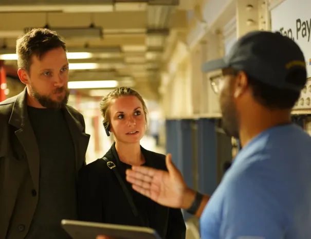 guide talking to guests