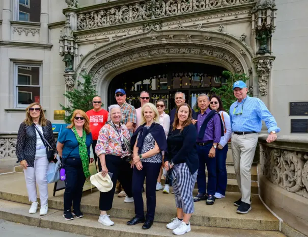 A tour group poses outside the Ukrainian Institute