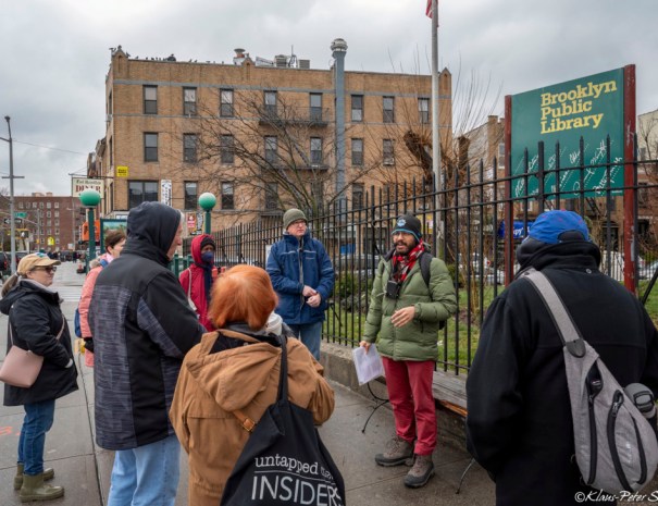 Group of tourgoers gather in Brooklyn