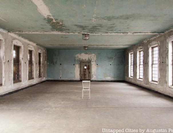 abandoned room with chair in the middle