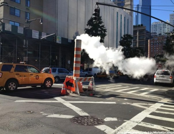 Steam coming out of the sidewalk