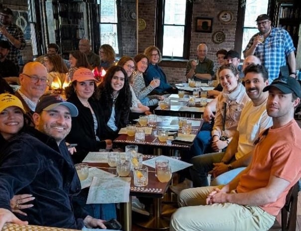 A tour group enjoys cocktails at Quick Eternity