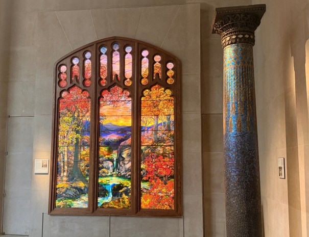 A Tiffany stained glass window and column